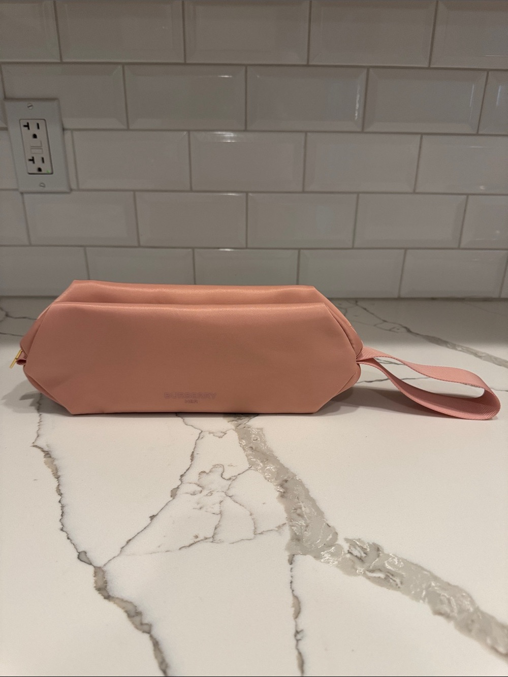 Burberry her makeup bag